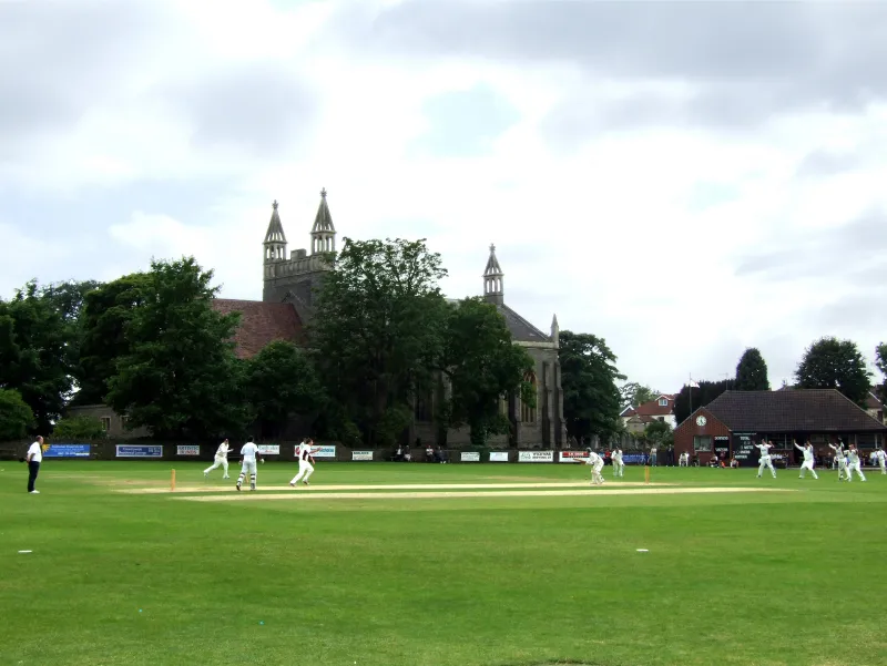 Cricket match at Downend with Christ Church in the background — WG Grace's birthplace